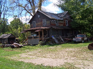 An old country house in need of repair along the trail